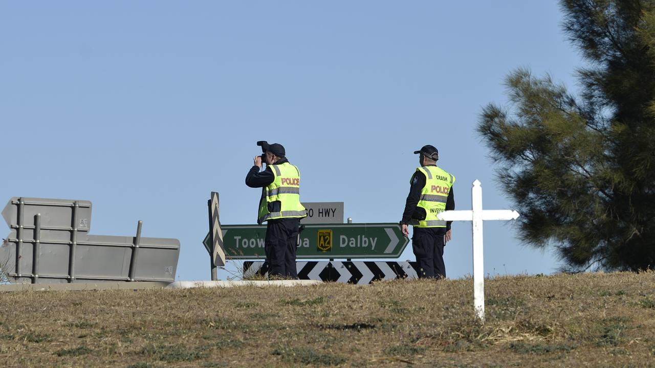 Police Forensic Crash Unit (FCU) officers at the scene of a fatal car and truck crash at intersection of Warrego Hwy and Toowoomba Rd, Oakey, Sunday, May 3, 2020. Picture: Kevin Farmer