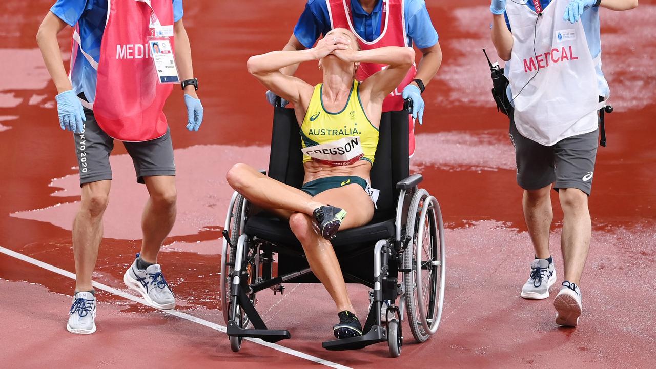 Genevieve Gregson of Team Australia reacts as she is wheeled off injured during the Women's 3000m Steeplechase Final on day twelve of the Tokyo 2020 Olympic Games at Olympic Stadium on August 04, 2021 in Tokyo, Japan. (Photo by Matthias Hangst/Getty Images)