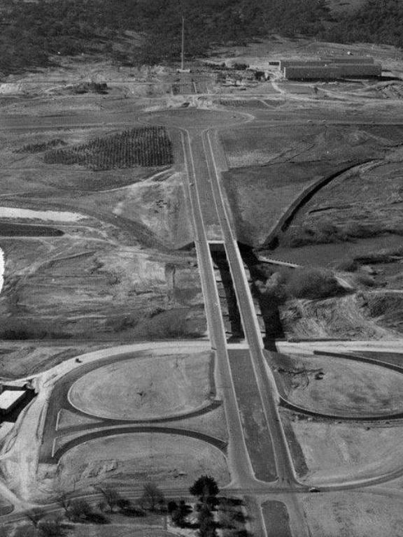 Kings Ave Bridge and Russell Offices during the construction phase and before Lake Burley Griffin had water — circa 1961. Source: The Canberra Page