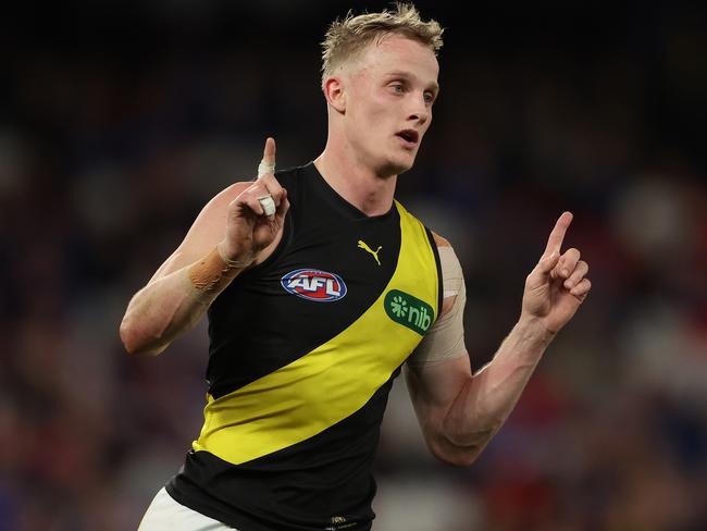 MELBOURNE, AUSTRALIA - AUGUST 04: Noah Cumberland of the Tigers celebrates after scoring a goal during the round 21 AFL match between Western Bulldogs and Richmond Tigers at Marvel Stadium, on August 04, 2023, in Melbourne, Australia. (Photo by Robert Cianflone/Getty Images)