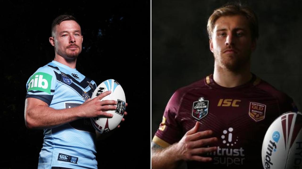 Damien Cook of the Blues and Cameron Munster of the Maroons.
