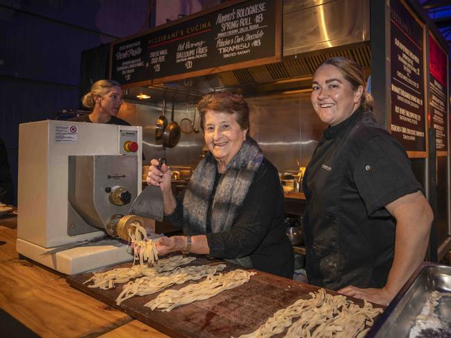 Liv Pizzirani-Rand owner on right with nonna Dina Pizzirani at Pizzirani's Cucina at Winter Feast 2025 in Hobart. Picture: Caroline Tan