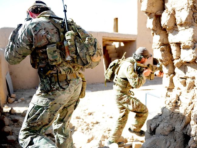 Special Operations Task Group soldiers practice drills in a training compound at Multi National Base - Tarin Kowt. Picture: Department of Defence