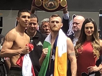 Jaime Munguia (left) and Dennis Hogan (right) at the weigh-in in Mexico ahead of their  world title fight on Sunday. 