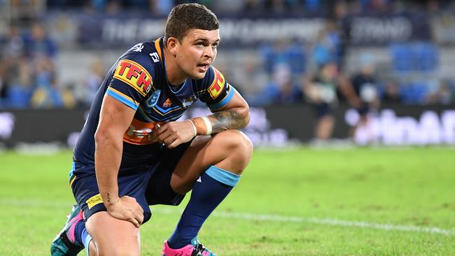 Ashley Taylor endured a tough day out for the Titans. Picture: AAP