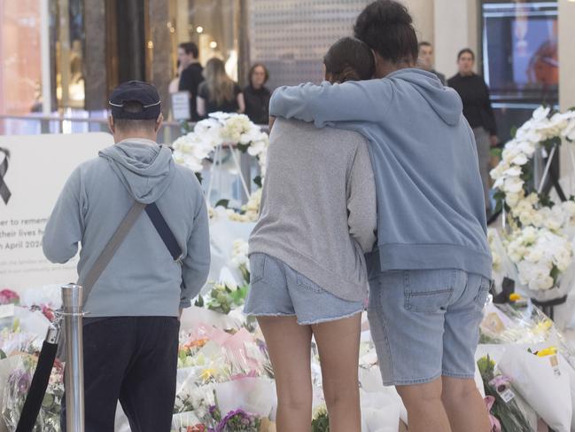 SYDNEY, AUSTRALIA.NewsWire Photos. April 20, 2024.Tributes flow as shoppers return to Westfield shopping centre in Bondi Junction a week after 40 year old Joel Cauchi stabbed and killed six people and wounded many others before being shot dead by police .  Picture: NCA NewsWire / Jeremy Piper