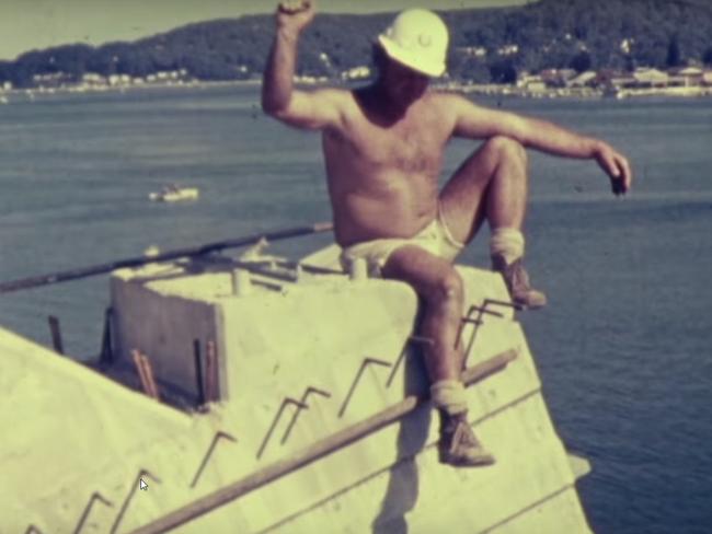 A bare chested construction worker purched precariously during construction of The Rip Bridge. Picture: 1974 DMR film.