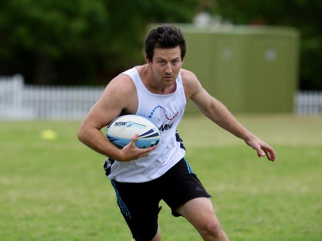 Resmed and Woolworths are holding a charity touch footy day to raise money for The Children's Hospital at Westmead.Action from the game