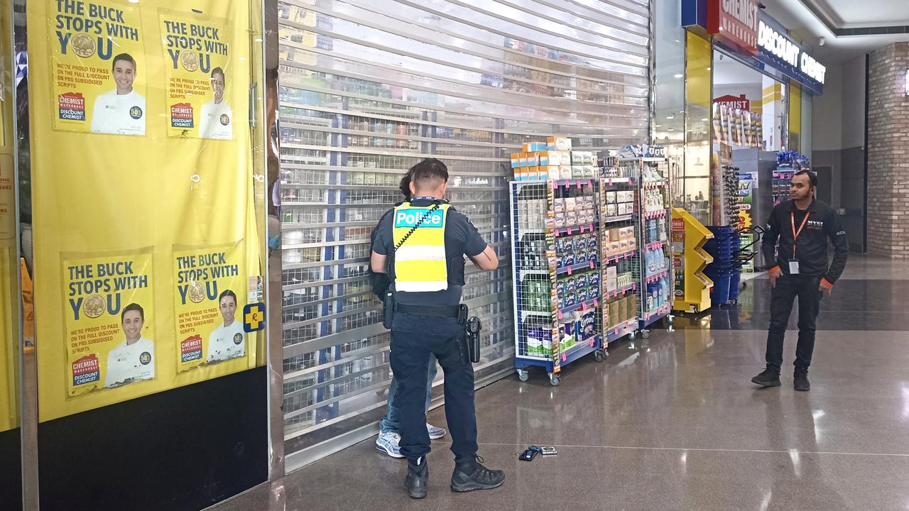 A man is spoken to by a police officer at Westfield. Photos: Victoria Police.