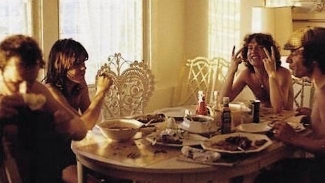 AC/DC members Brian Johnson, Angus Young and Malcolm Young at breakfast in the Bahamas where they recorded Back in Black.