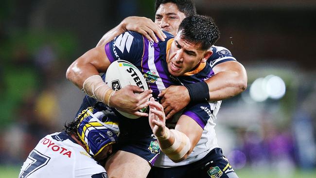 Nelson Asofa Solomona charges into the Cowboys defence.