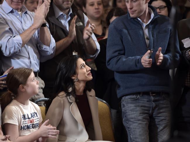 Hillary Clinton aide Huma Abedin (C) sits front row at Hillary Clinton’s concession speech. Picture: AFP