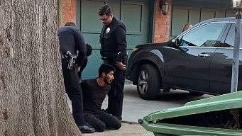 LA residents use zip ties to restrain a suspected arsonist before calling police