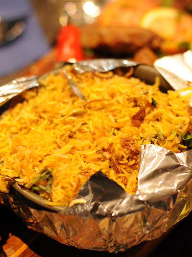 The menu includes three types of types of biryani, with chicken, goat and vegetarian options from $16.