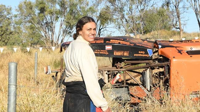 Driver Shannon Lander's daughter and navigator lets others drivers know they are okay as they pass the 30km mark on the first day of Finke Desert Race 2022. Picture: (A)manda Parkinson