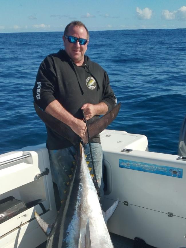 Shane Hodgens after fighting with the fish for more than an hour. Picture: Facebook