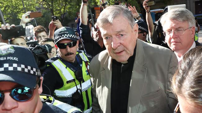 Cardinal George Pell arrives at court during his trial.