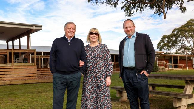 Taking in the grounds at their passion project, Sam and Christine Tarascio with Rabbi Moshe Khan. Picture: Ian Currie