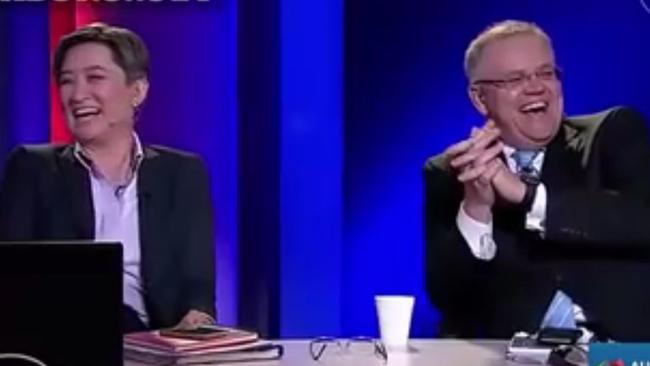 Lost it: Penny Wong and Scott Morrison dissolve into laughter in response to Sales’ ‘suck on that, Kerry’ aside. Courtesy: ABC