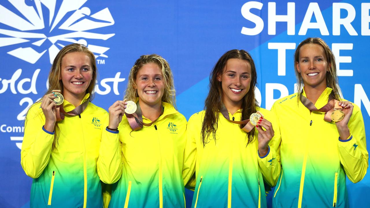 Emma McKeon, Brianna Throssell, Leah Neale and Ariarne Titmus of Australia with their relay gold.