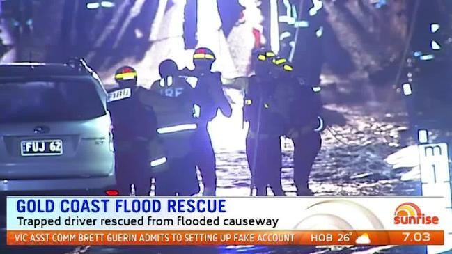 Driver rescued from Gold Coast floods