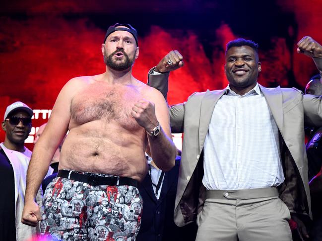 LONDON, ENGLAND - SEPTEMBER 07: Tyson Fury and Francis Ngannou face off during a Tyson Fury v Francis Ngannou Press Conference at HERE on September 07, 2023 in London, England. (Photo by Justin Setterfield/Getty Images)