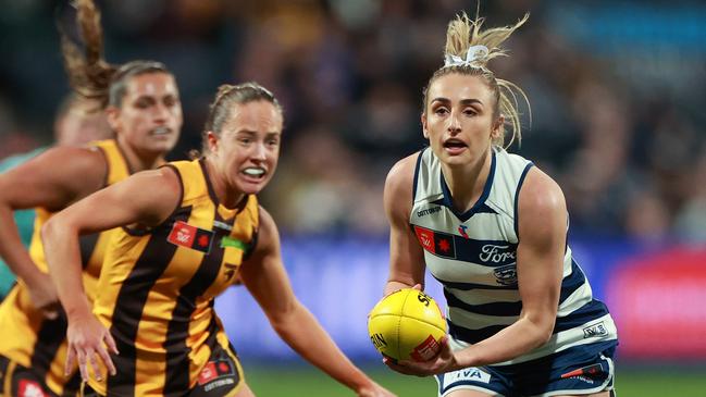 GEELONG, AUSTRALIA - SEPTEMBER 26: Amy McDonald of the Cats runs with the ball during the round five AFLW match between Geelong Cats and Hawthorn Hawks at GMHBA Stadium, on September 26, 2024, in Geelong, Australia. (Photo by Kelly Defina/Getty Images)