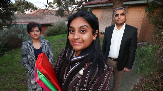 Cost of living and the rise in independent and private school fees. Parents Kiran and Sunny Jadhav, with their daughter Sachi 18, who is a year 12 Ivanhoe Grammar student.    Picture: David Caird