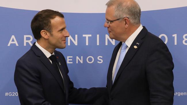 French President Emmanuel Macron greets Mr Morrison in Buenos Aires last year. Picture: AFP