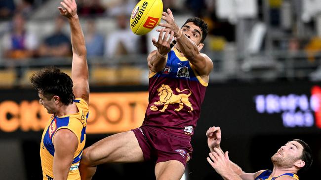 Charlie Cameron flies for a mark against the Eagles on Saturday night. Picture: Bradley Kanaris/Getty Images