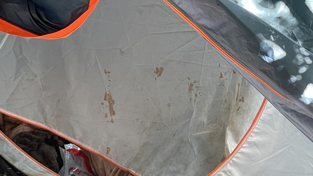 WHat appear to be blood splatters on the entrance to the woman’s tent. Picture: Supplied.
