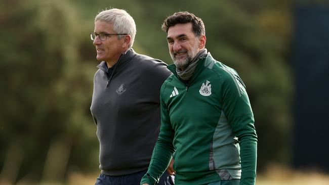 PGA Tour boss Jay Monahan and Yasir Al-Rumayyan, governor of Saudi Arabia's Public Investment Fund, which is behind LIV Golf. Picture: Richard Heathcote/Getty Images