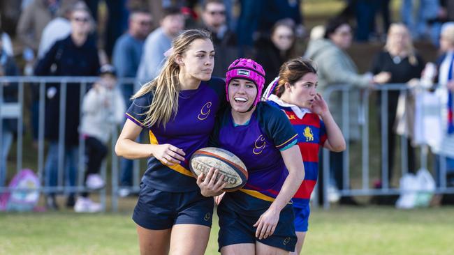 Glennie players Zoe Waters (left) and Sophie Bender celebrate Sophie's try against Downlands in rugby sevens final game of the Selena Worsley Shield on Grammar Downlands Day at Downlands College, Saturday, August 6, 2022. Picture: Kevin Farmer