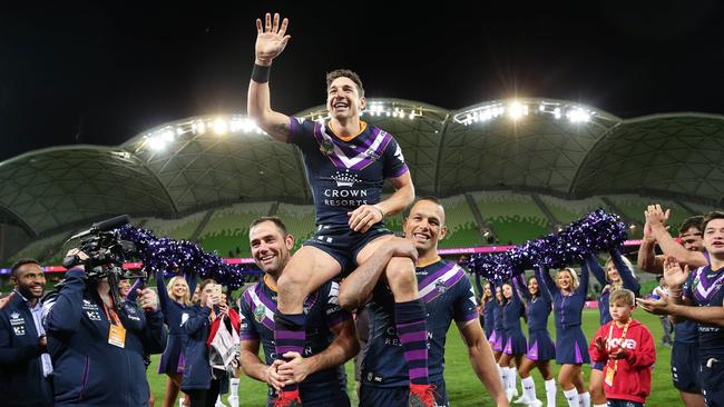 Billy Slater is chaired off after victory in the NRL preliminary final at AAMI Park. Picture: Brett Costello