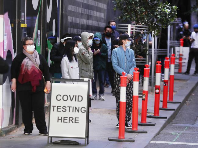 Covid testing queue for a clinic in Bourke Street as COVID 19 numbers begin to increase across Melbourne. Monday, DECEMBER 20, 2021. Picture: David Crosling