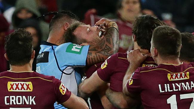 NSW Andrew Fifita rips back the head of Gavin Cooper after a try. Queensland vs New South Wales at ANZ Stadium in Sydney for game 3 in the State of Origin series. Pic Peter Wallis