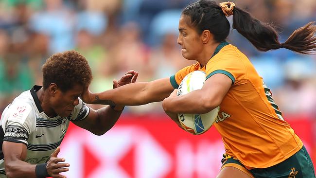 Sariah Paki is tackled as Australia’s women finished fifth at the tournament. Picture: Mark Metcalfe/Getty Images