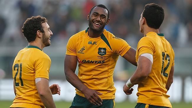 Tevita Kuridrani shares a laugh with Wallaby teammates Nick White and Matt Toomua.