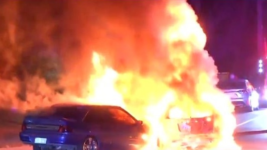 Two cars have gone up in flames following a crash in Marsden, south of Brisbane. Picture: 7 News