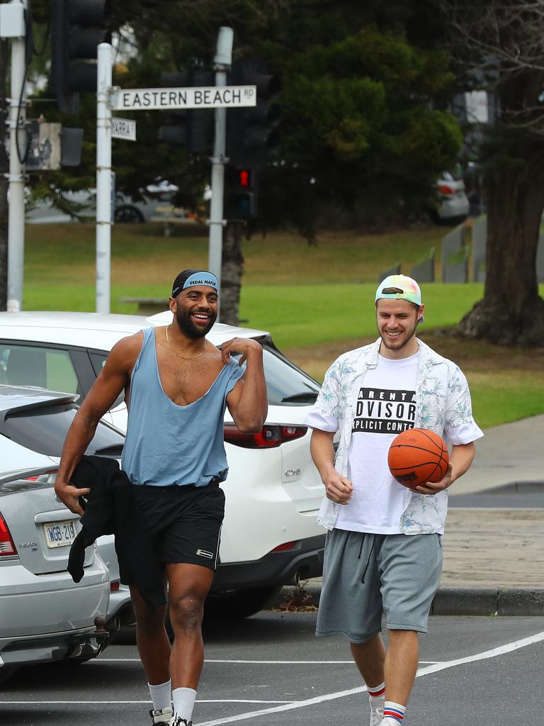 Esava Ratugolea and Jake Kolodjashnij arriving for the Cats Mad Monday. Picture: Alison Wynd