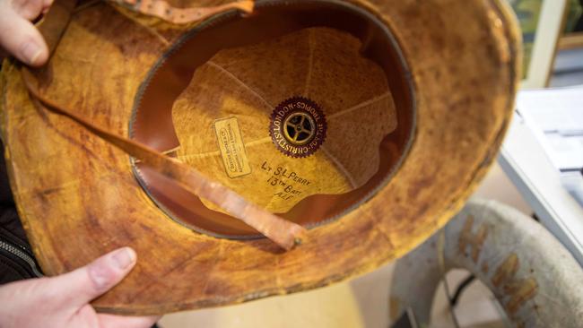 A helmet from World War I is one of the items up for auction at Gowans in Moonah. Picture: Linda Higginson