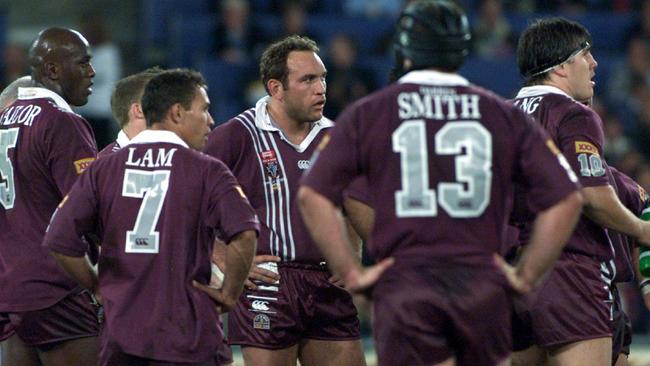 Disappointed Qld players after that defeat in 2000. (Brett Faulkner)