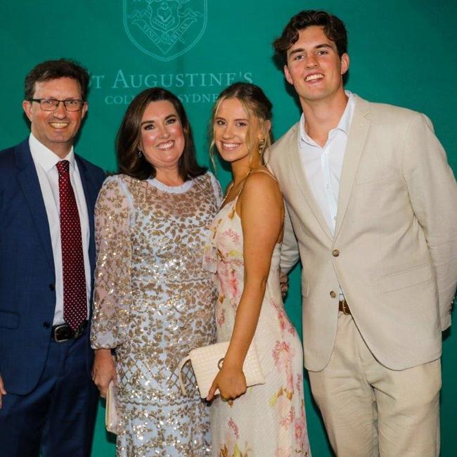 Joshua Seward and guests at the St Augustine's College, Brookvale, Year 12 Formal and Valedictory Dinner. Parents toasted the school staff and students for getting through what was a difficult 2021.