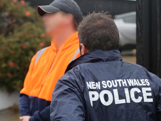 Specialist police have charged two men, seized more than 4.5kg of MDA and uncovered a large clandestine laboratory in Sydney's southwest. Pictures: NSW Police