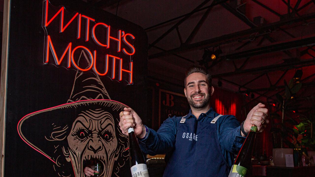 Pat Garnham of Osare with a unique method of serving drinks through the Witches mouth at Dark Mofo Winter Feast. Picture: Linda Higginson
