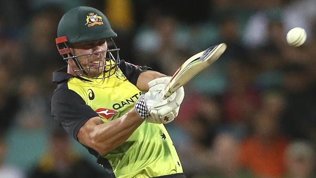 Chris Lynn smacks a six against New Zealand.