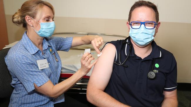 Dr Paul Griffin, an infectious disease expert, getting his AstraZeneca vaccine at the Mater Hospital today. Picture: Annette Dew