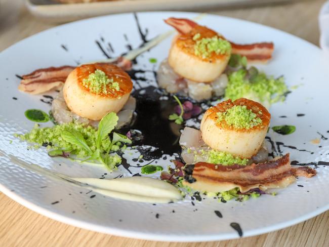 Canadian scallops with squid ink and crispy pancetta. Picture: Jenifer Jagielski