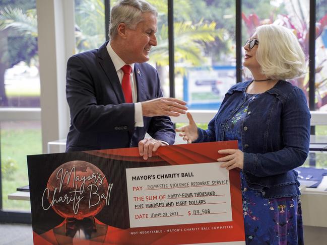 Mackay Mayor Greg Williamson handing a cheque for half of the proceeds from the Mayor's Charity Ball to Mackay Women's Services executive director Linda-Ann Northey. The ball also fundraised for Heart Kids. Picture: Heidi Petith