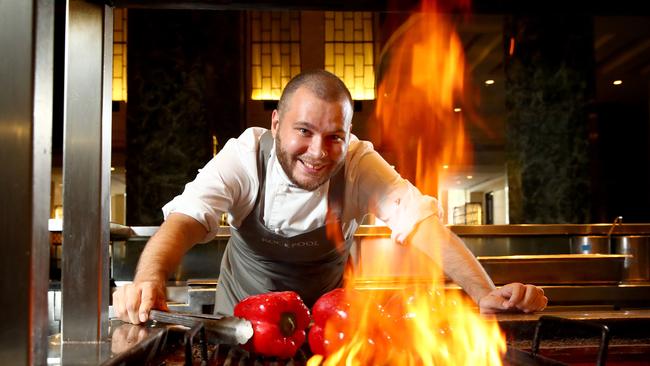 Apprentice chef Lochlan Simms in the kitchen at Rockpool Bar and Grill. Picture: Toby Zerna